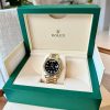 Rolex Day-Date 40mm Yellow Gold Onyx Baguette 228238-0059