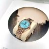 Rolex Everose Gold Day-Date 36 128235-0064 Mặt Số Turquoise